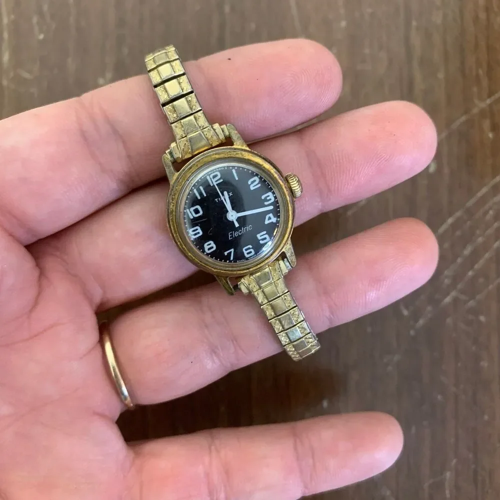Vintage Women's Gold Timex Electric Analog Black‎ Face Speidel band Wrist Watch
